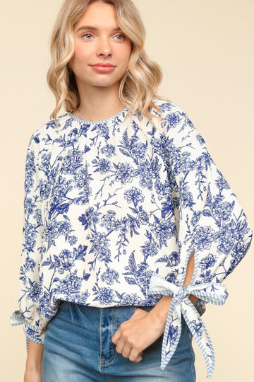 FLORAL WOVEN TOP WITH BACK NECK BUTTON