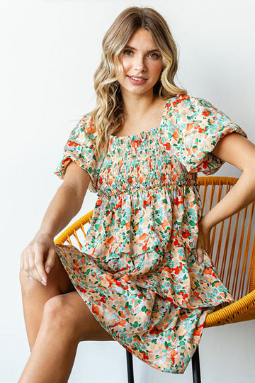 APRICOT FLORAL PRINT TIERED DRESS FEATURING SMOCKED CHEST