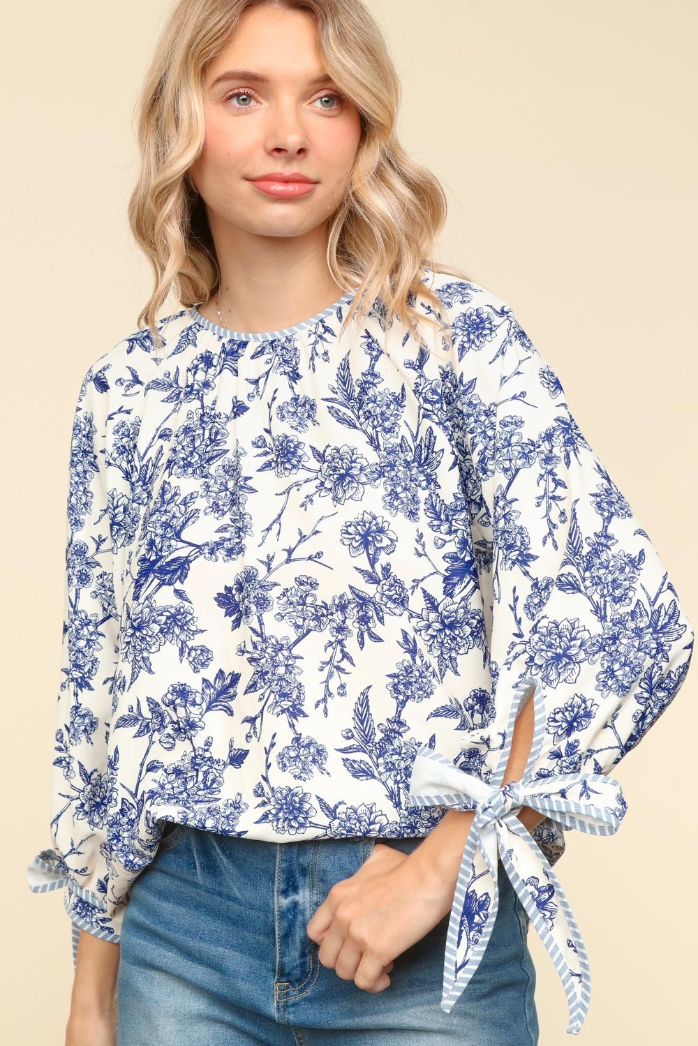 FLORAL WOVEN TOP WITH BACK NECK BUTTON